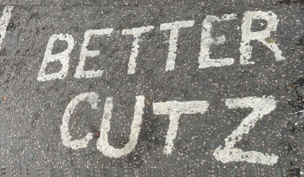 Coalition Checks K & C Charity Cuts